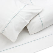 White Sheet with Light Blue Piping + Pillowcases (600 TC)